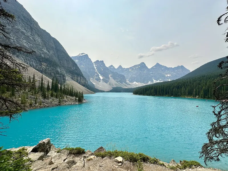 A pristine turquoise jewel surrounded by rugged peaks, Moraine Lake is a postcard-perfect vision of the Canadian Rockies.