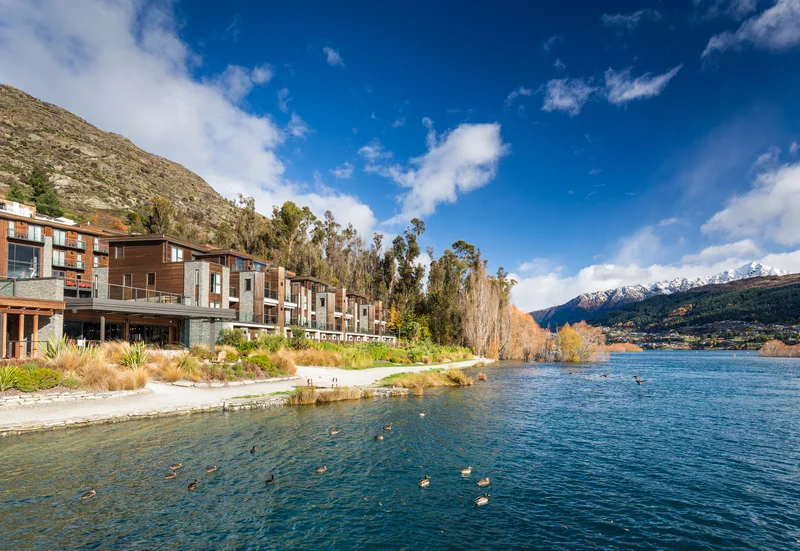 Hilton Queenstown waterfront buildings and Lake Wakatipu