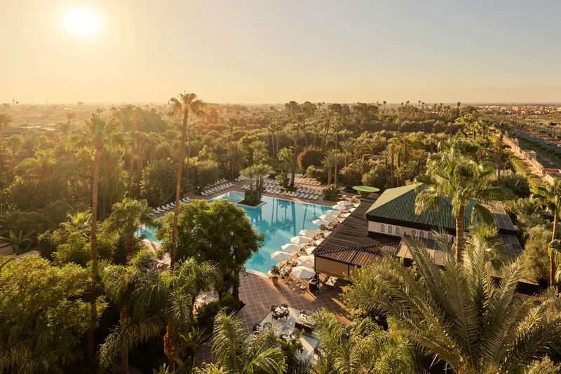 La Mamounia gardens and outdoor pool in warm evening light