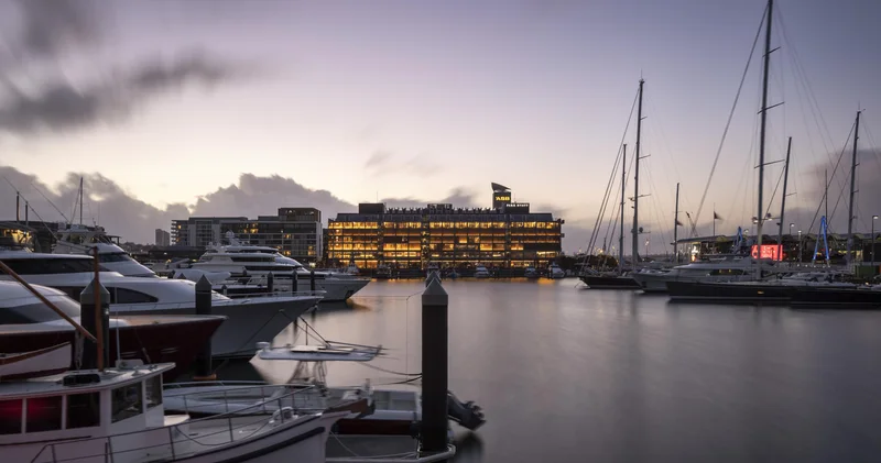 Park Hyatt Auckland waterfront exterior and marina at dusk