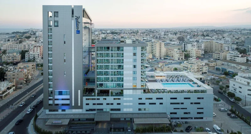 Radisson Blu Hotel exterior and surrounding Larnaca cityscape