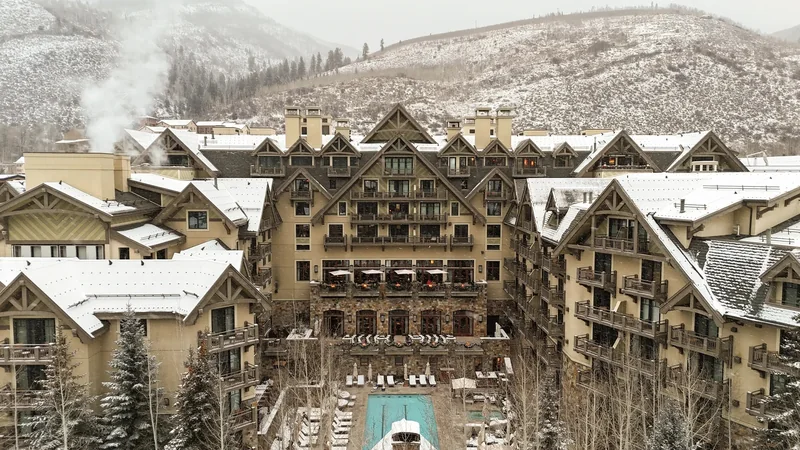 Snow-covered exterior and courtyard pool at Four Seasons Resort Vail