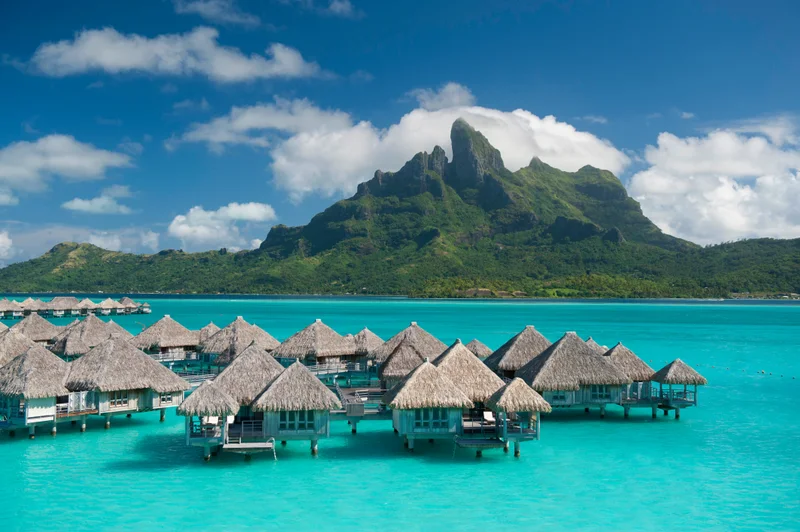 St. Regis Bora Bora overwater villas, lagoon and Mount Otemanu