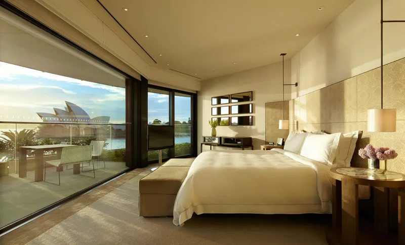 Sydney Suite bedroom at Park Hyatt Sydney, with harbour and Opera House view