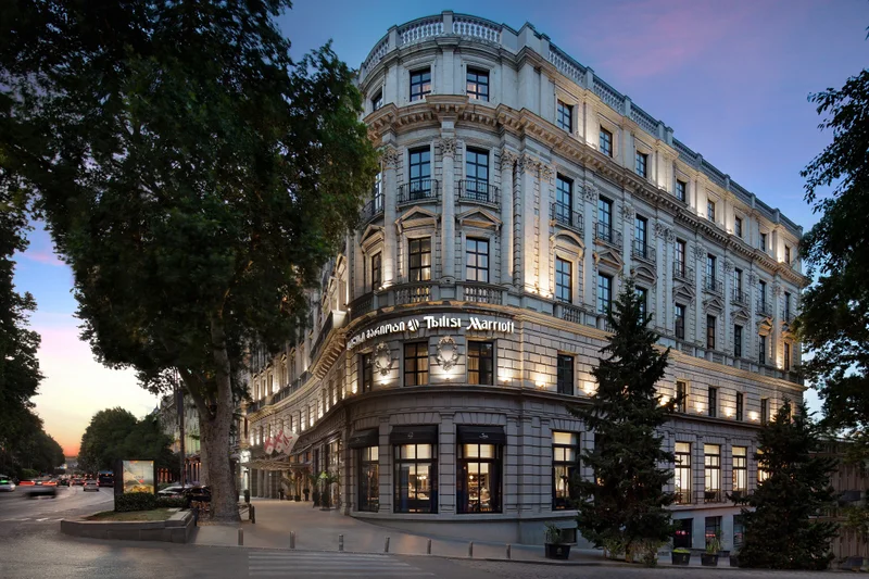 Tbilisi Marriott Hotel exterior at dusk